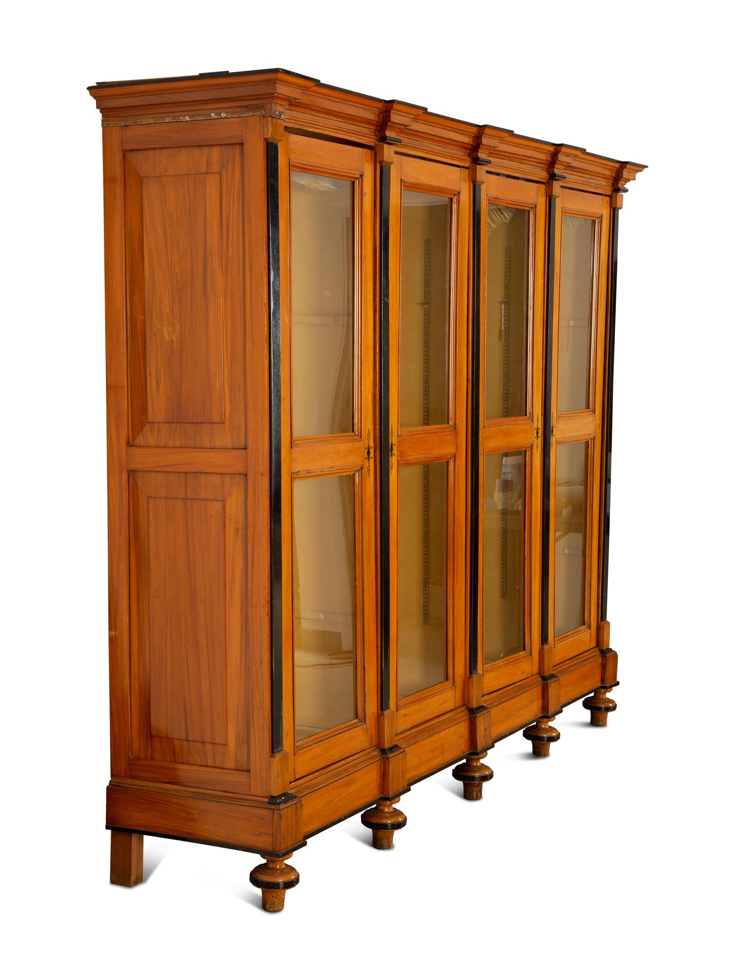 A Biedermeier Style Walnut Bookcase — 19th/20th Century