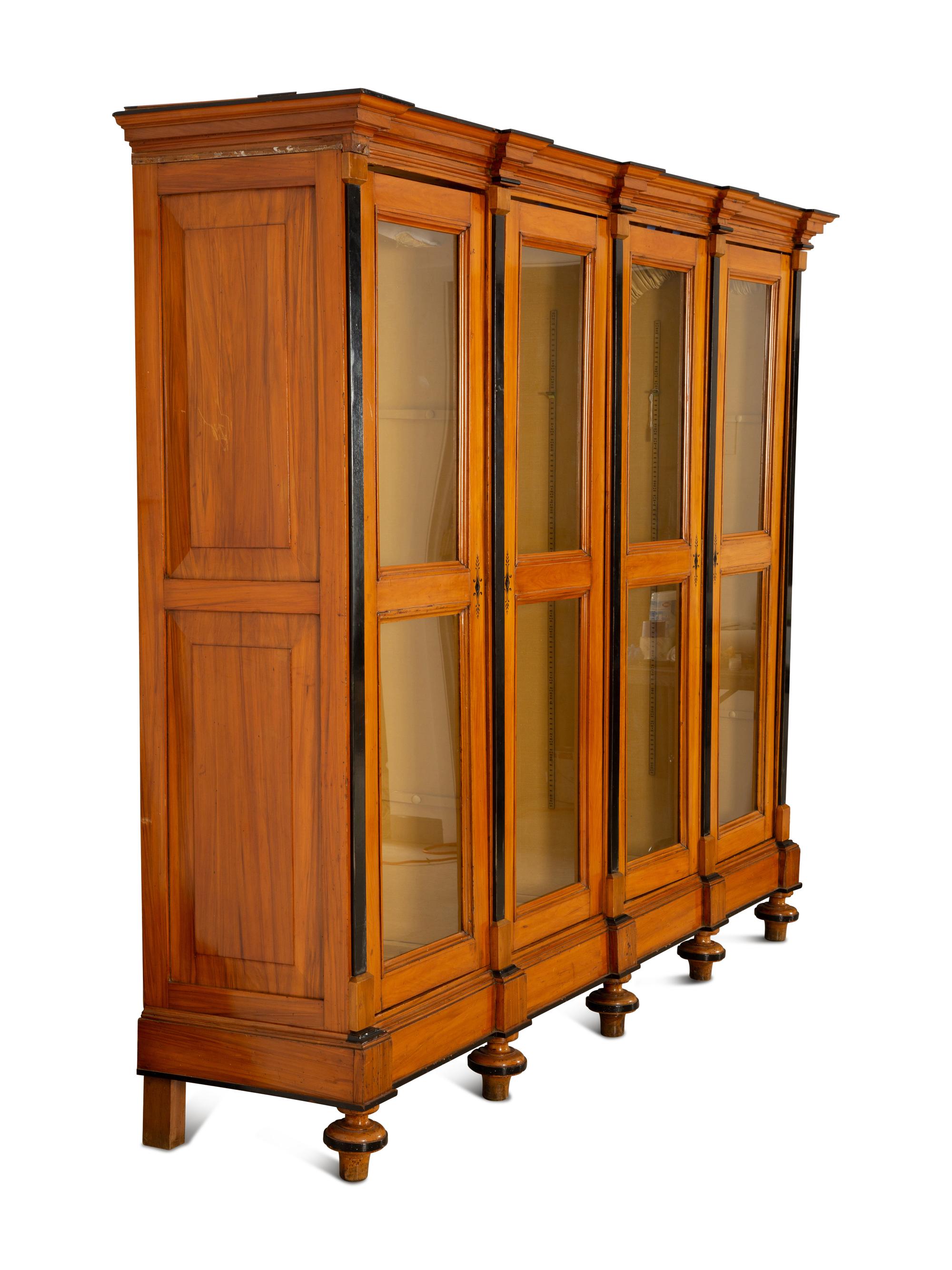 A Biedermeier Style Walnut Bookcase — 19th/20th Century