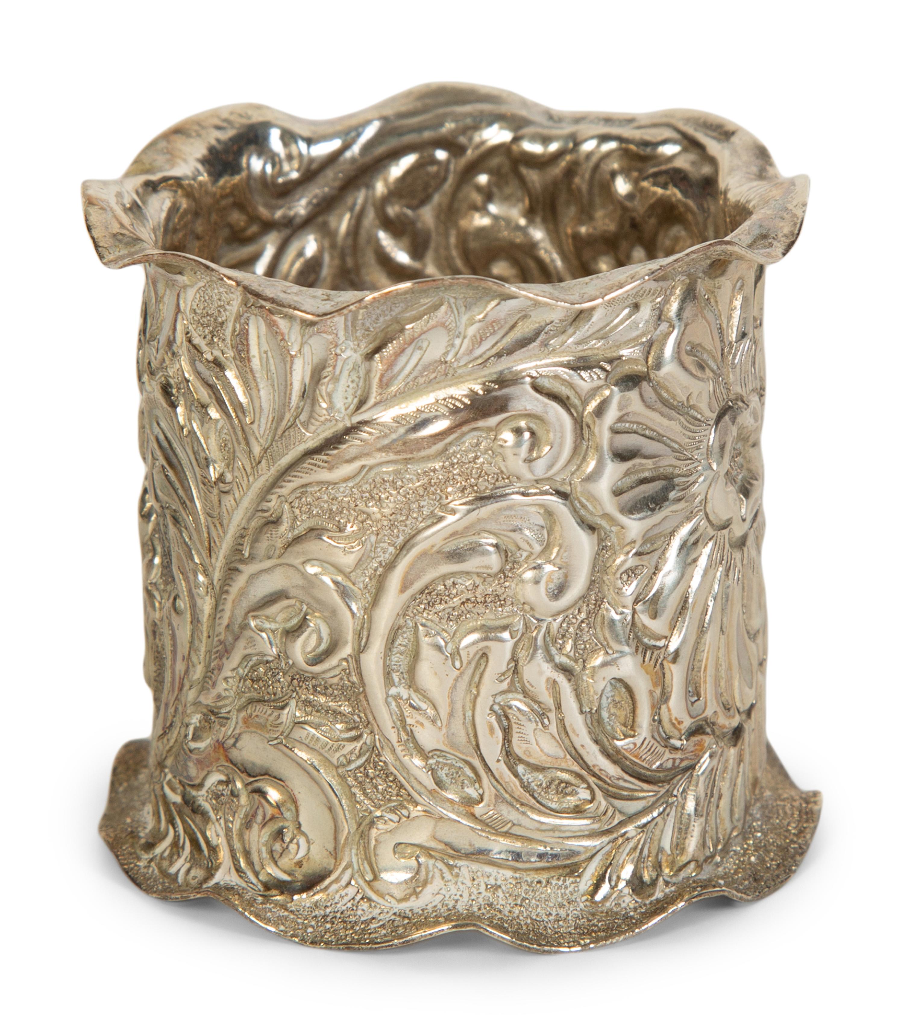 Twelve American Repoussé Silver Napkin Rings