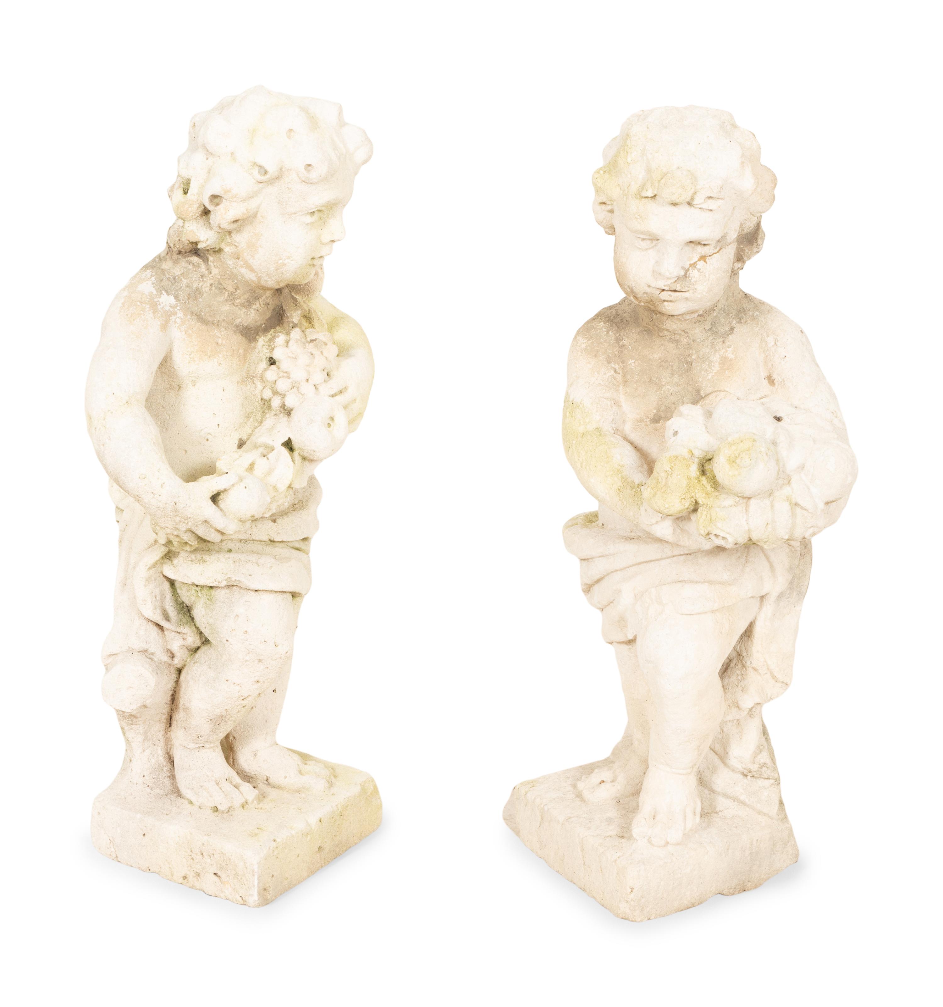 A Pair of Carved Stone Cherubs