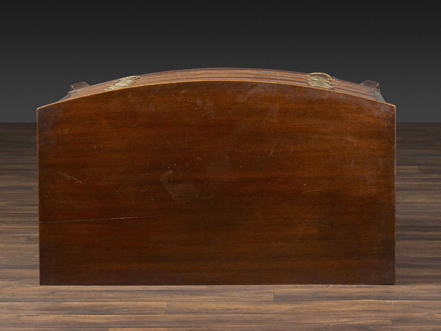 A Federal Inlaid and Figured Mahogany Bow-Front Chest of Drawers