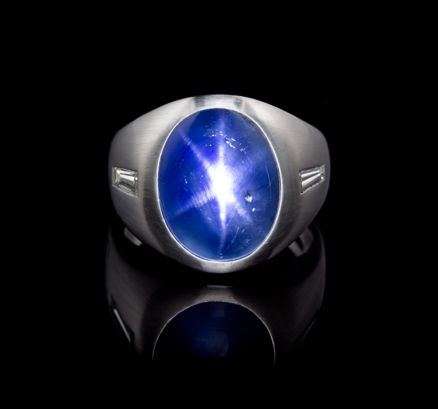 A Platinum, Burmese Star Sapphire and Diamond Ring, Circa 1955, 20.00 dwts.