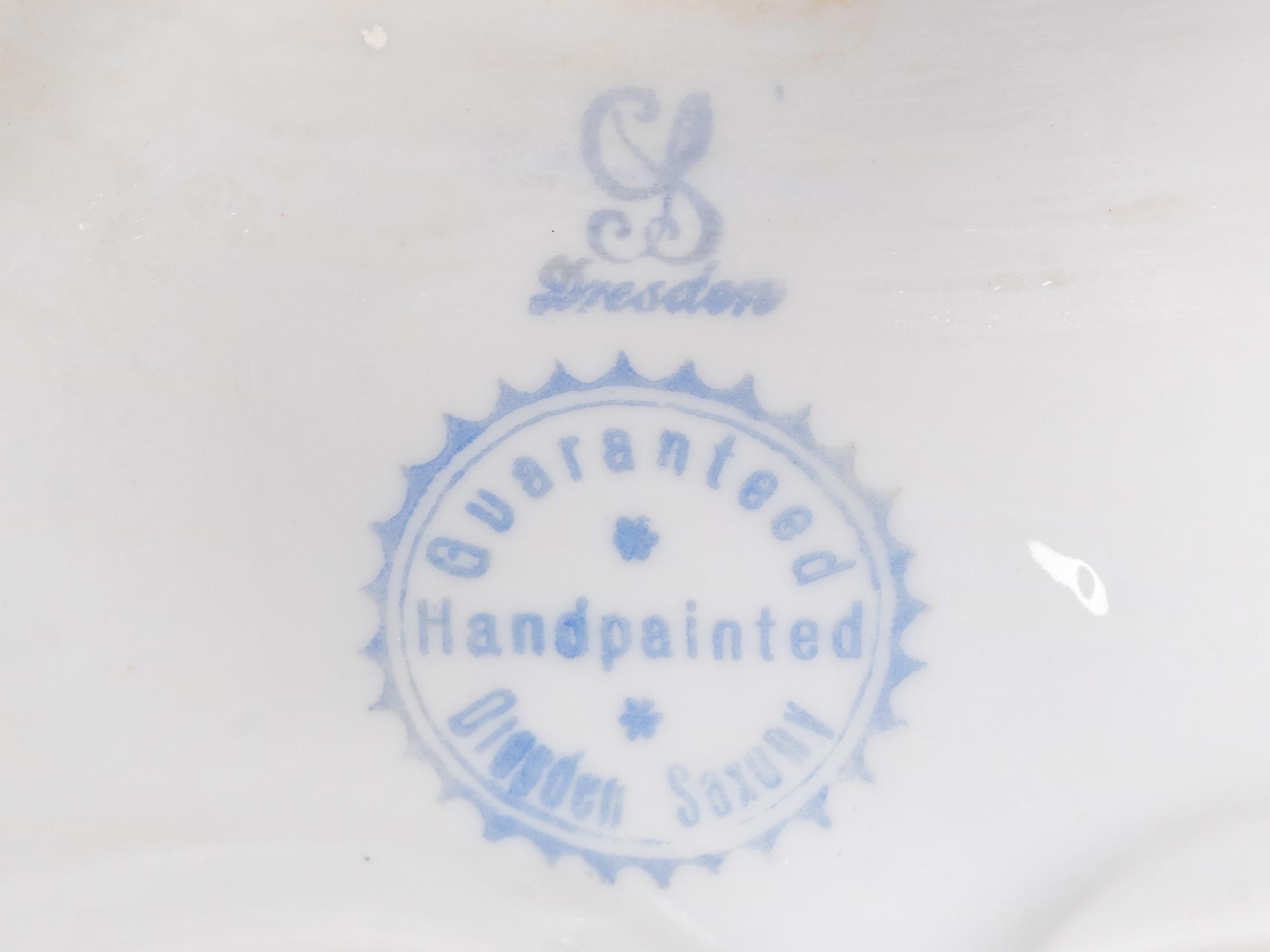 A Pair of Dresden Porcelain Candelabra