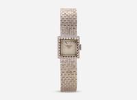 A Ladies 14K White Gold Movado Watch with Diamonds
