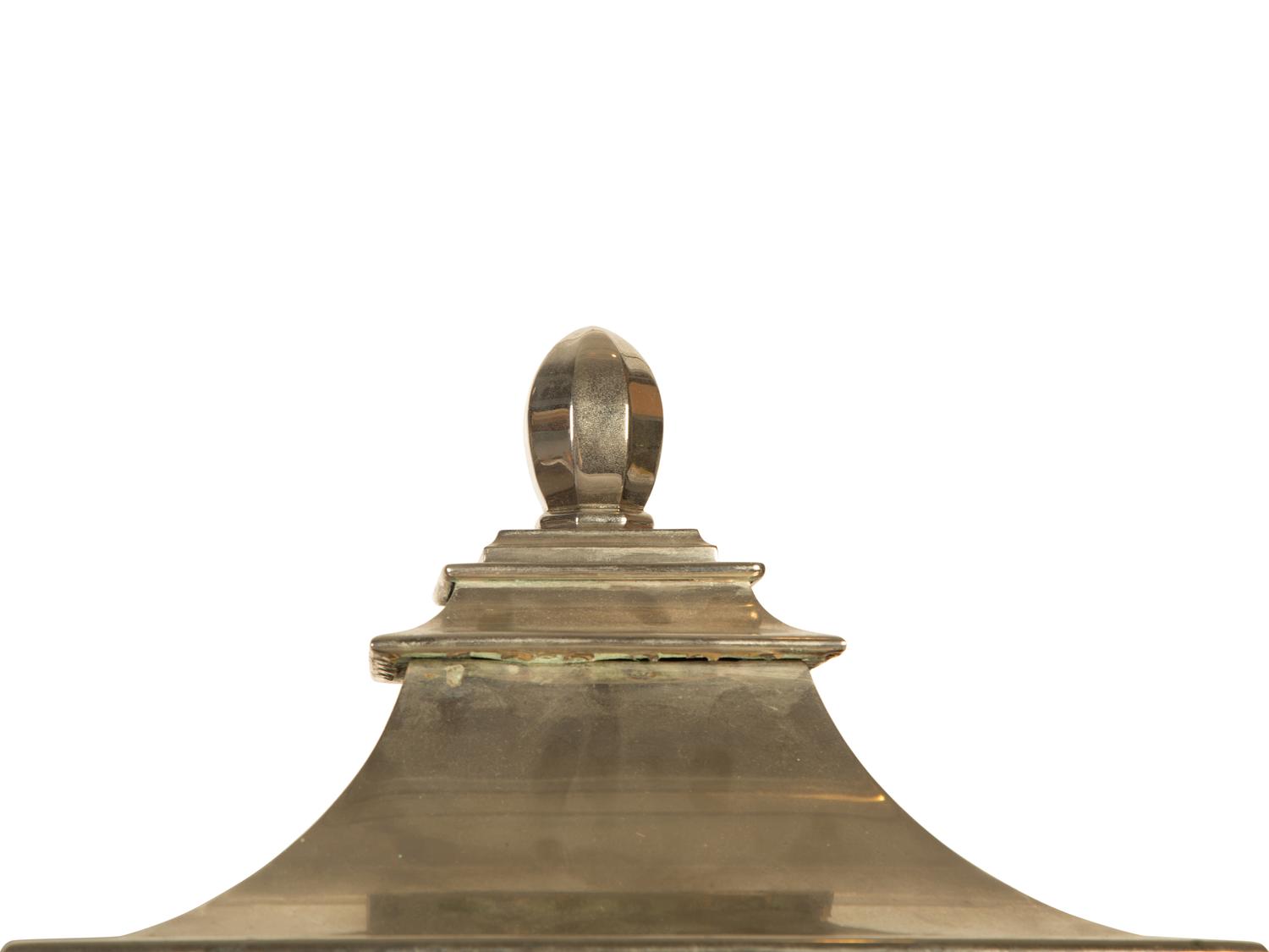 A Pair of Polished Silvered Metal and Glass Wall Lanterns