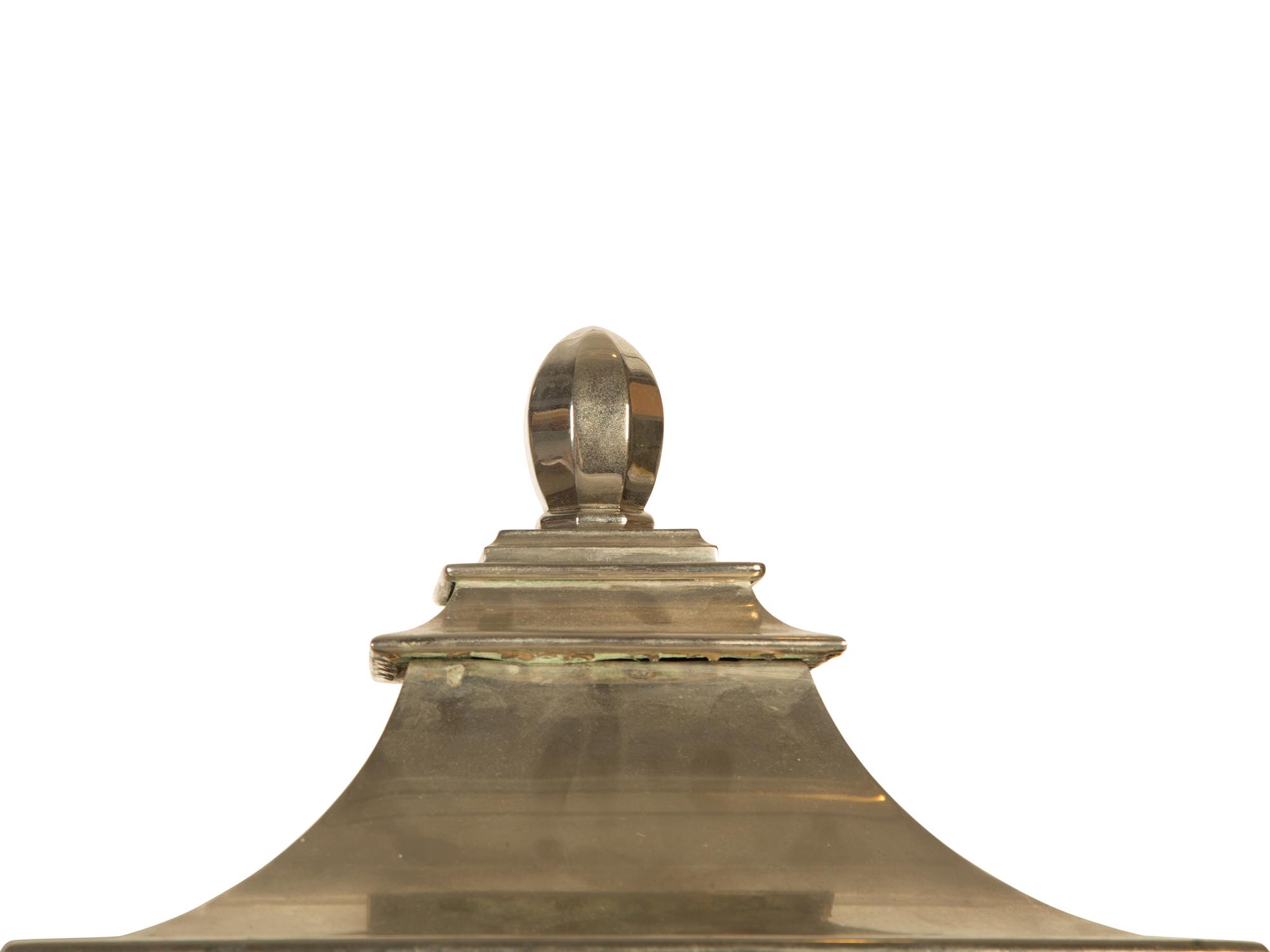 A Pair of Polished Silvered Metal and Glass Wall Lanterns