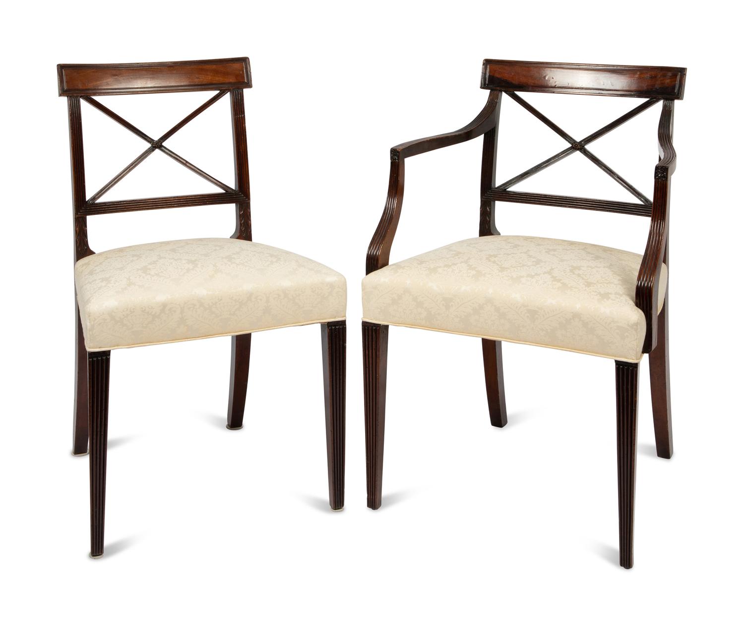 A Set of Six Regency Style Mahogany Dining Chairs and Two Armchairs