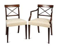 A Set of Six Regency Style Mahogany Dining Chairs and Two Armchairs