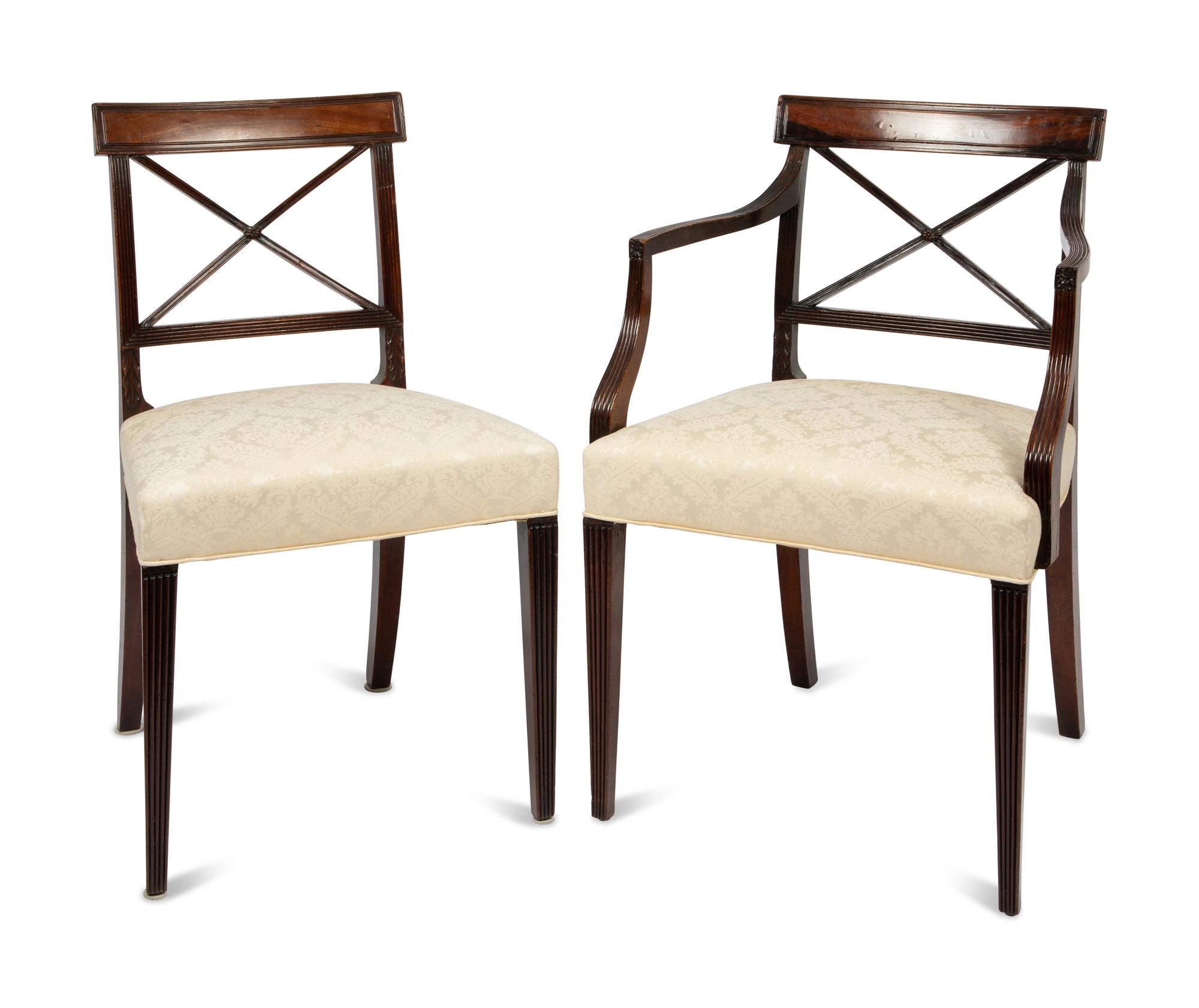 A Set of Six Regency Style Mahogany Dining Chairs and Two Armchairs