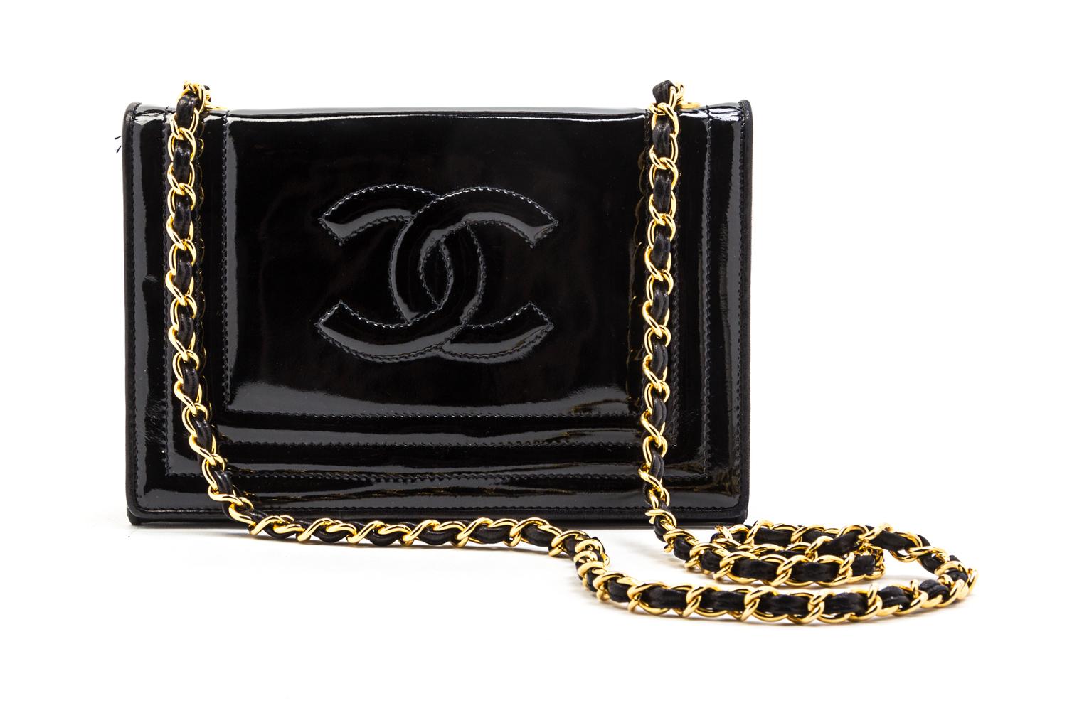 A Chanel Black Patent Leather Flap Bag, 7 1/2 x 5 x 2 inches.