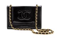 A Chanel Black Patent Leather Flap Bag, 7 1/2 x 5 x 2 inches.