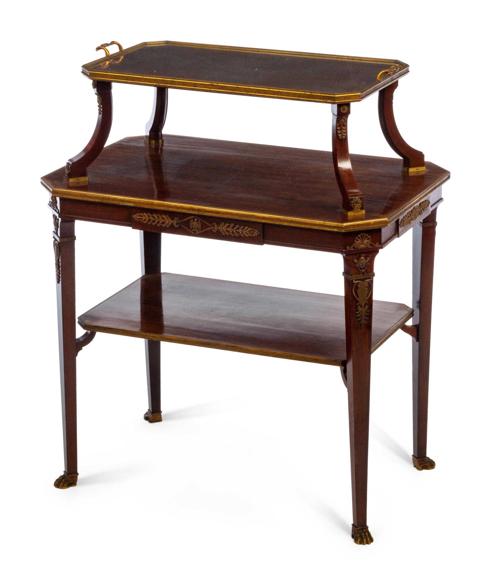 An Empire Style Gilt Bronze Mounted Mahogany Three-Tier Tray Table