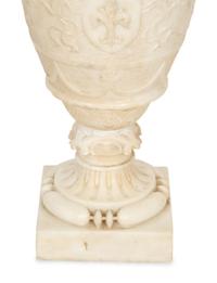 An Italian Carved Marble Urn with Griffin Handles