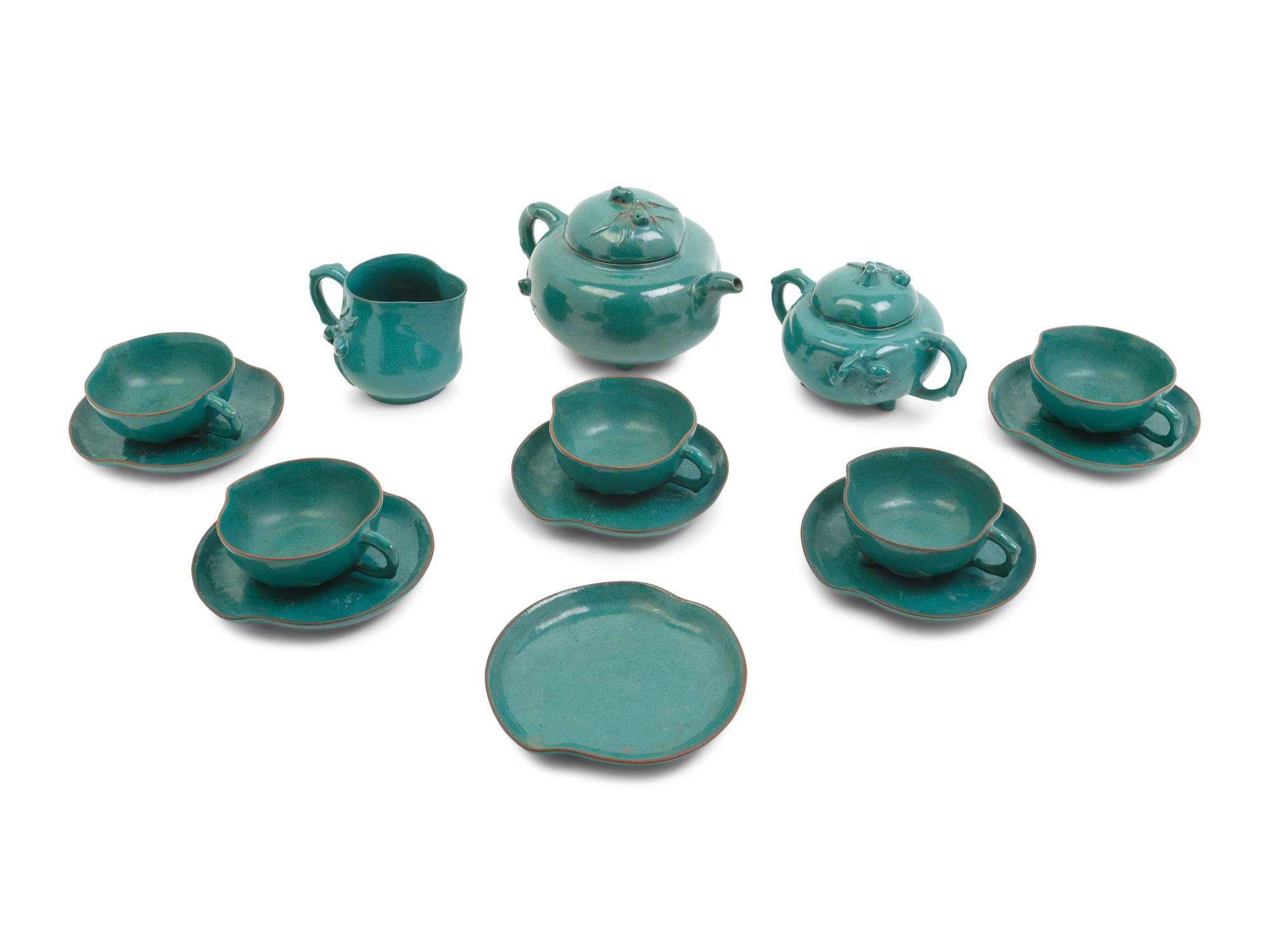 A Chinese Green Glazed Zisha Pottery Tea Set