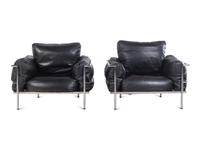 A Pair of Leather Upholstered Chrome Lounge Chairs in the Style of Le Corbusier
