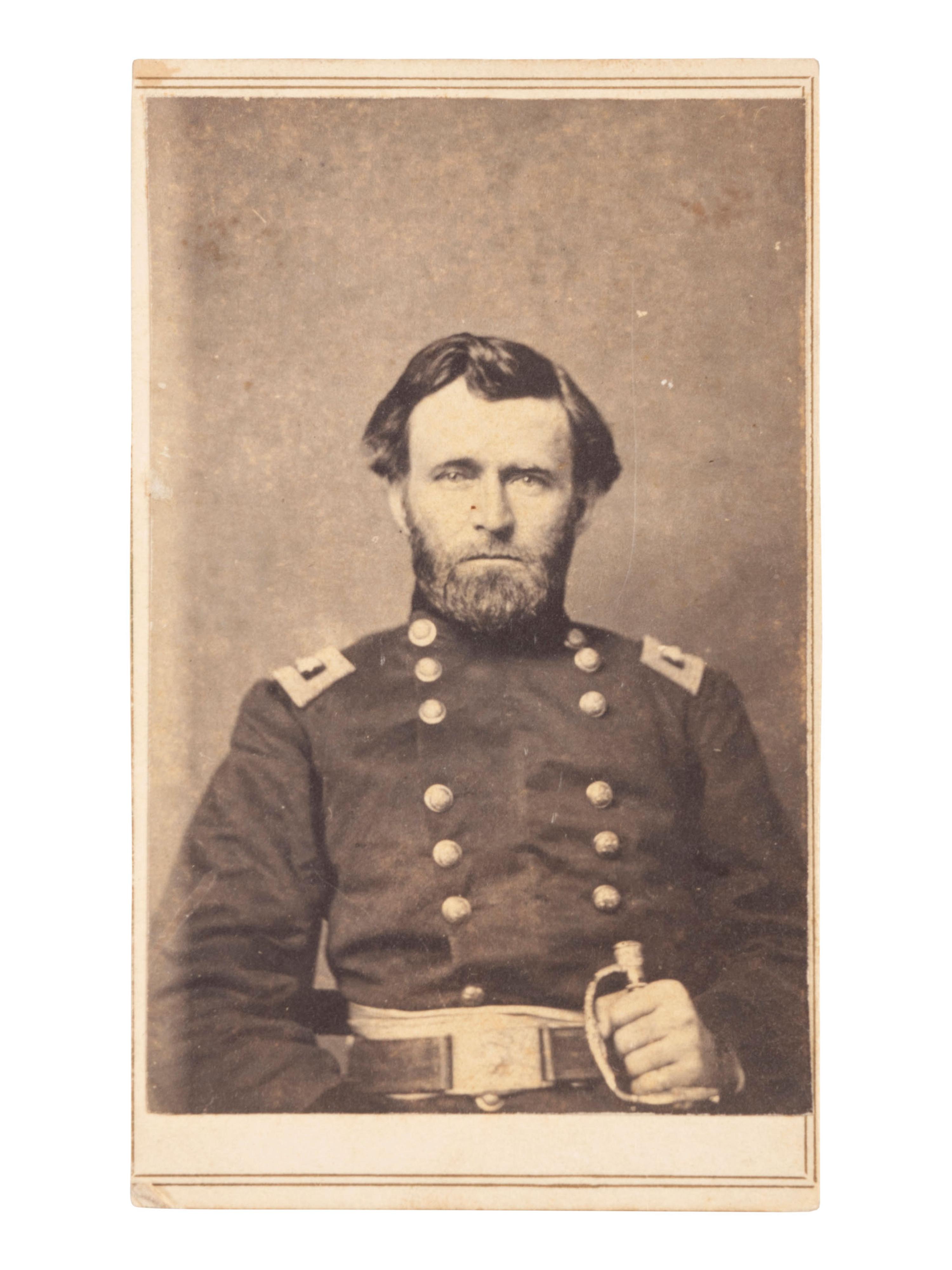 [CIVIL WAR]. CDV of Ulysses S. Grant clutching sword. Army of the Cumberland: J.W. Campbell, Army Photographer, 29th Army Corps, ca 1862.
