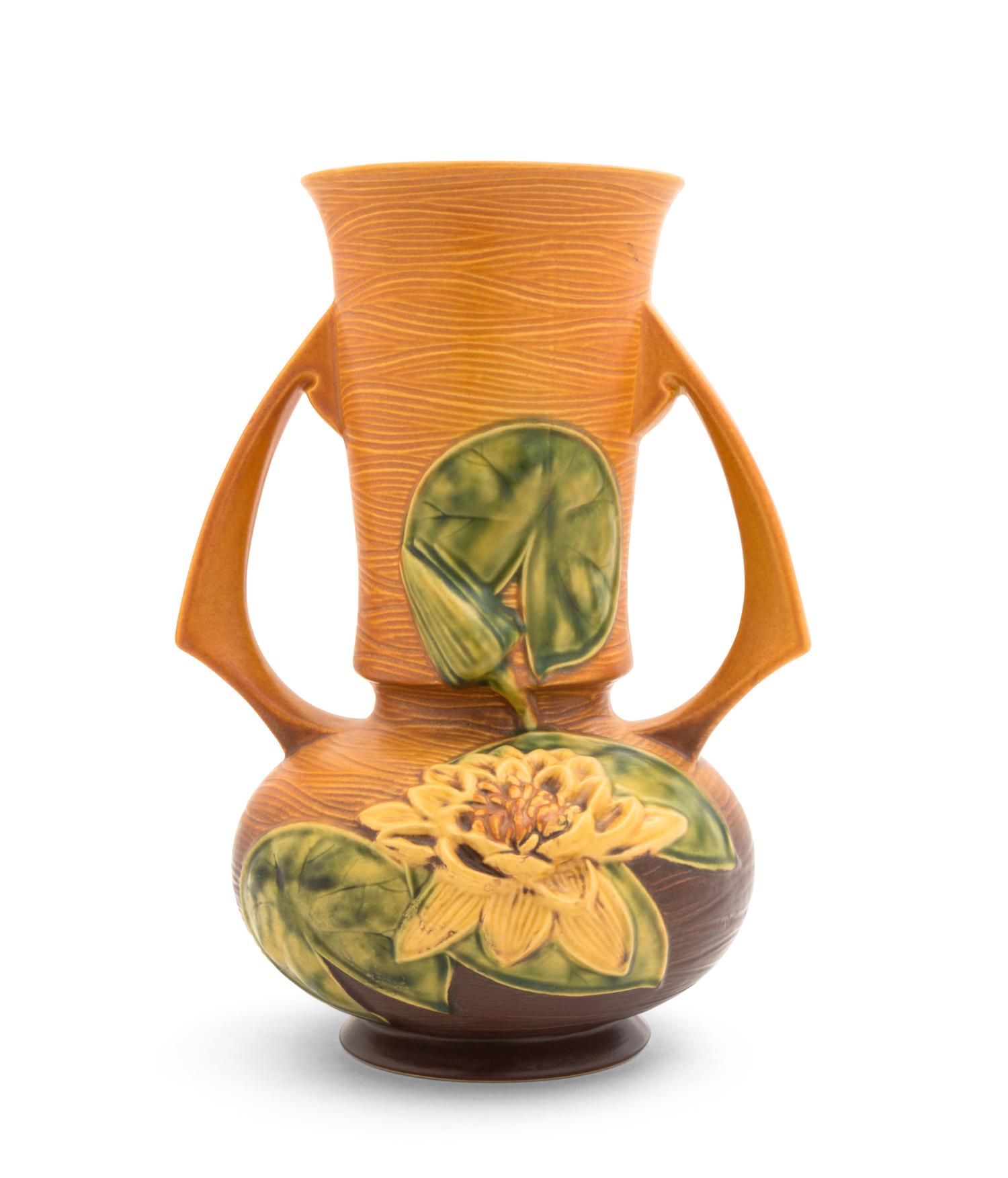 A Roseville Waterlilly Pottery Vase Height 12 1/4 inches.