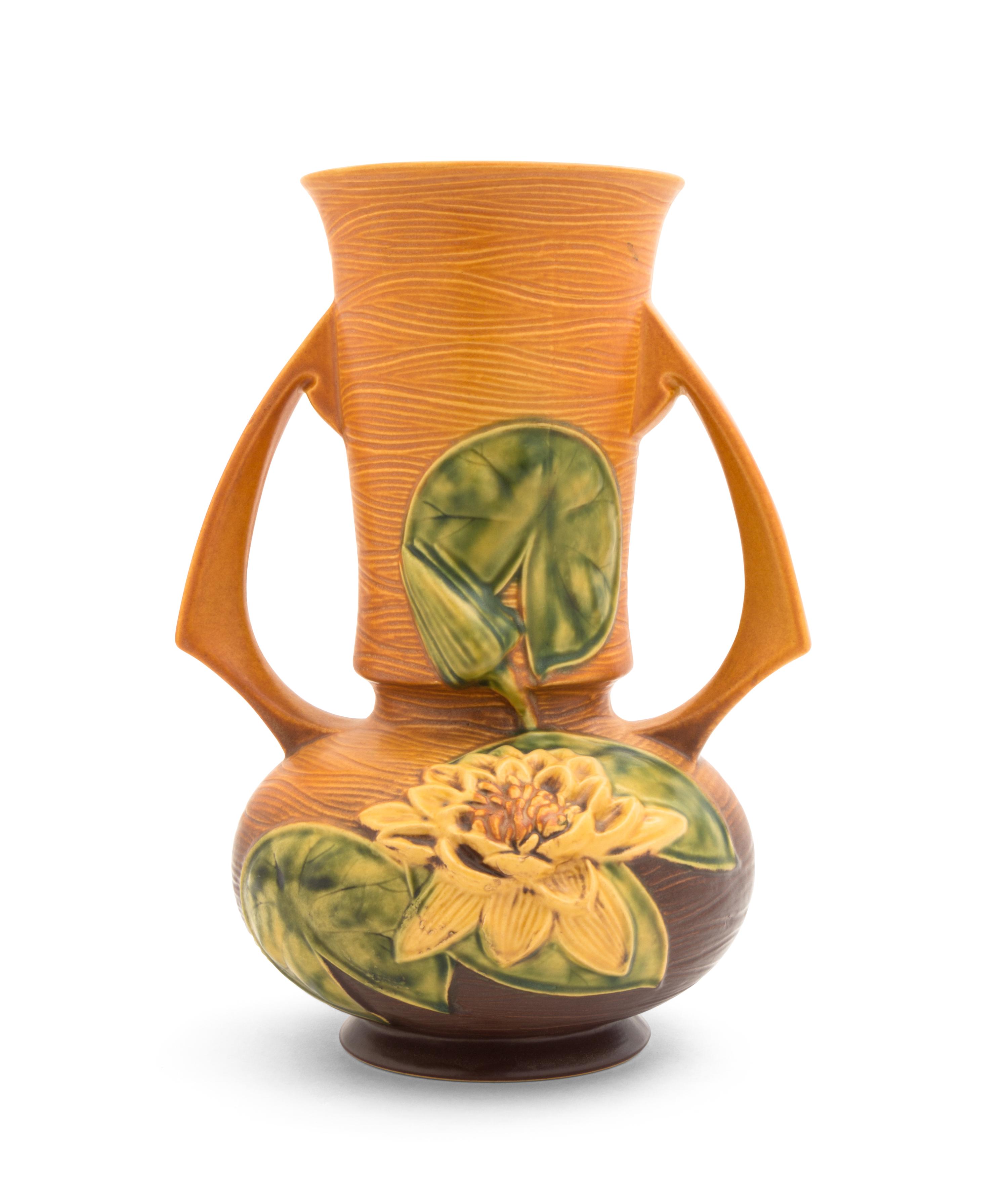 A Roseville Waterlilly Pottery Vase Height 12 1/4 inches.