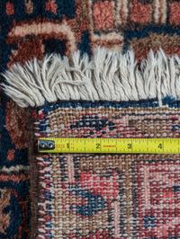 A Heriz Wool Rug