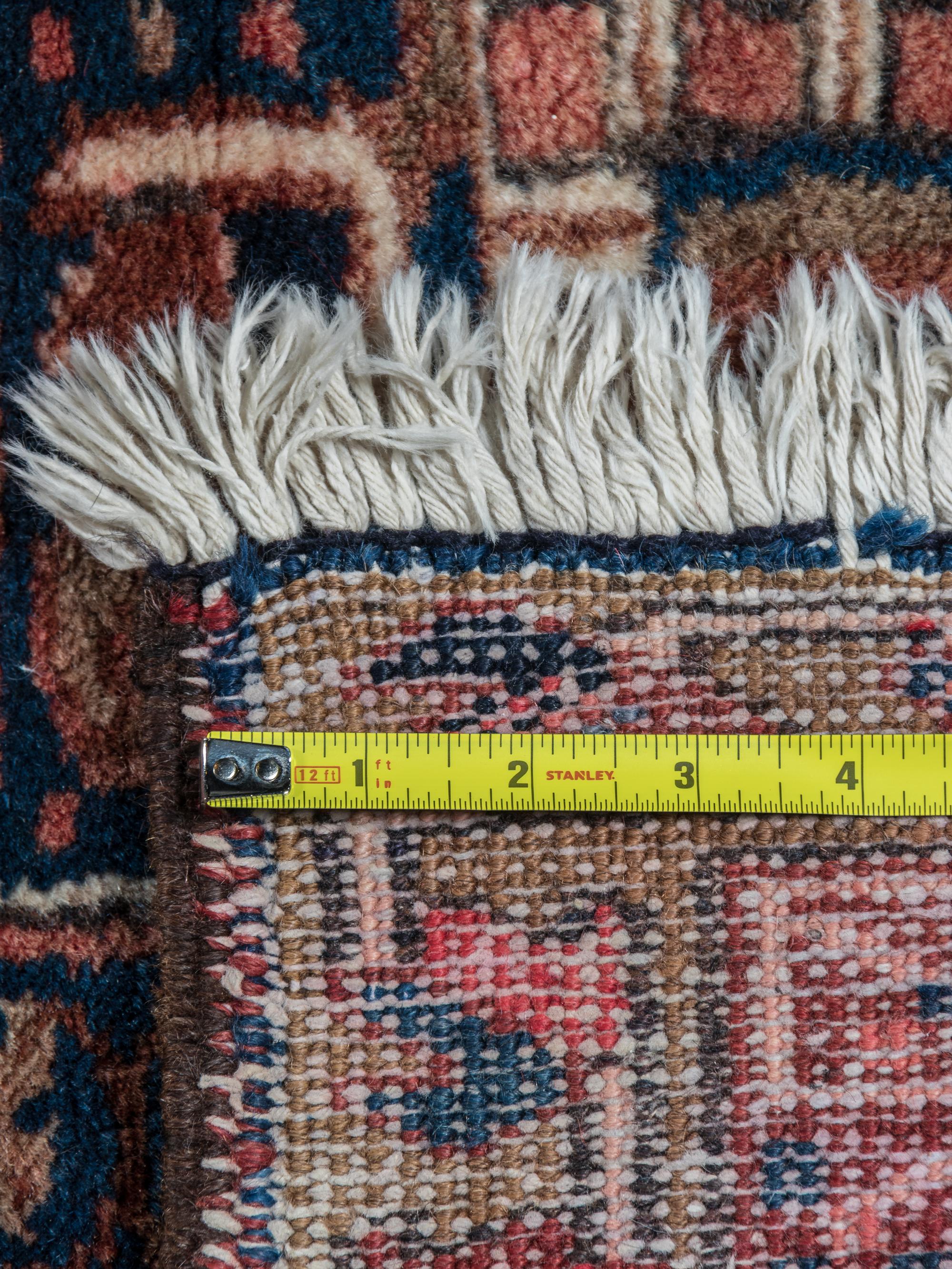 A Heriz Wool Rug