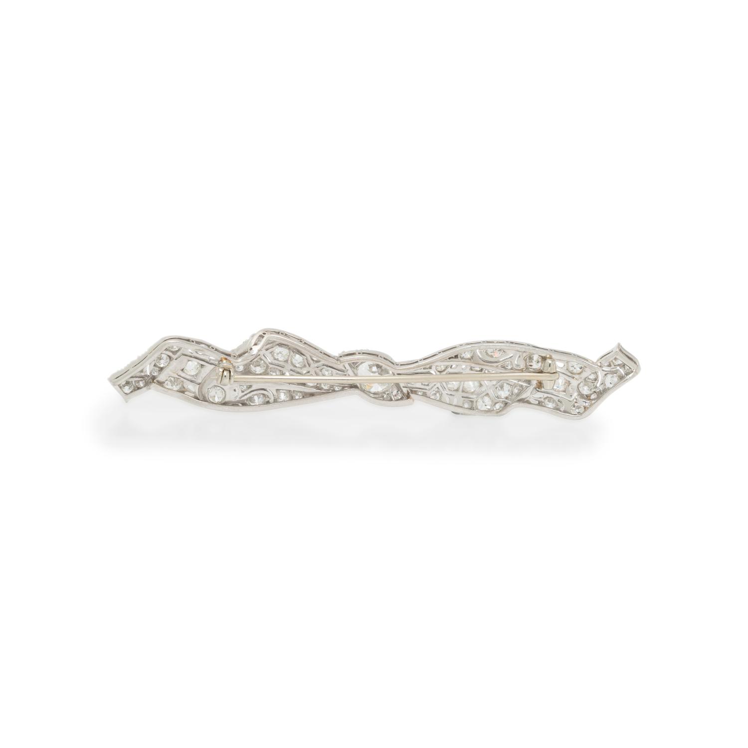 DIAMOND AND PLATINUM BOW BROOCH
