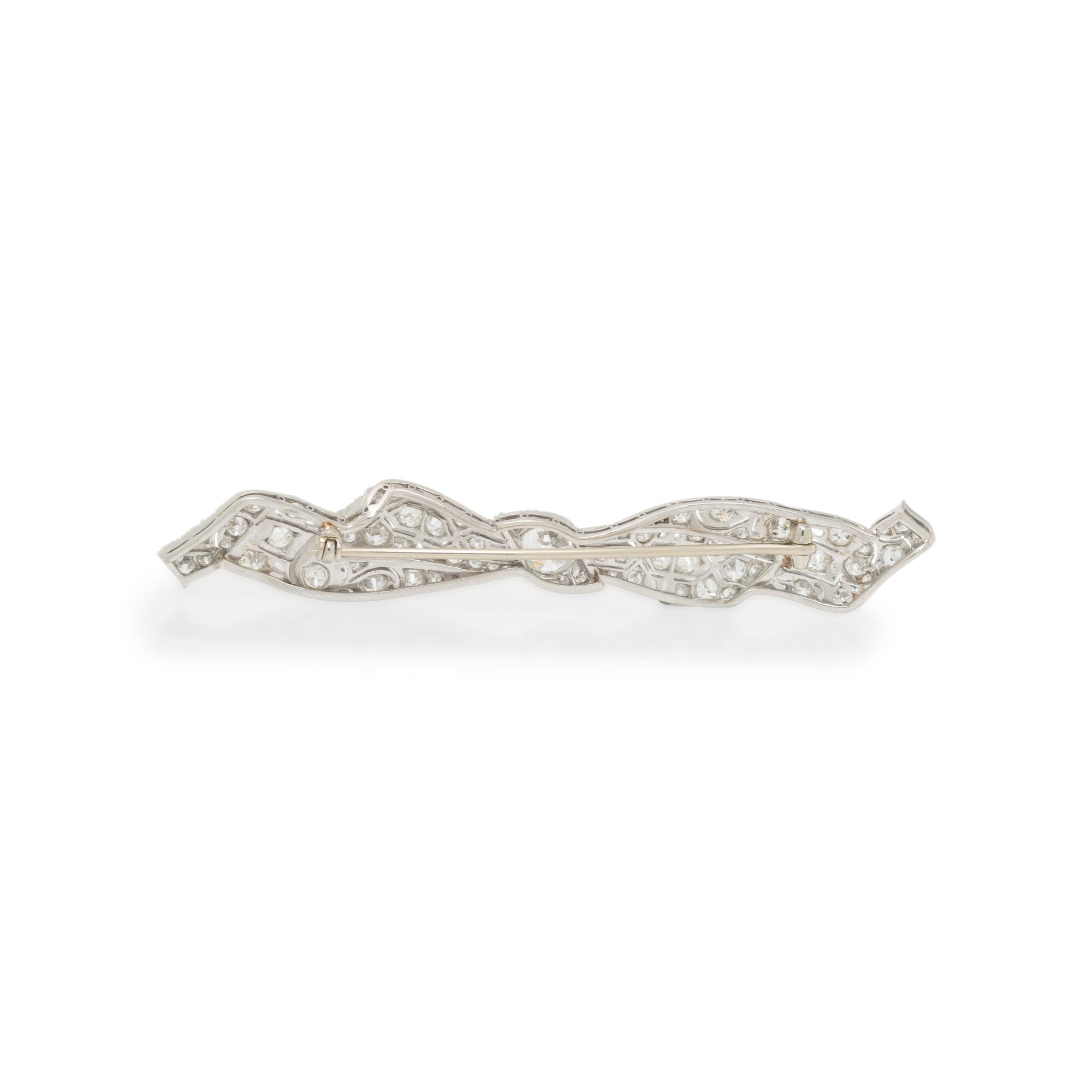 DIAMOND AND PLATINUM BOW BROOCH