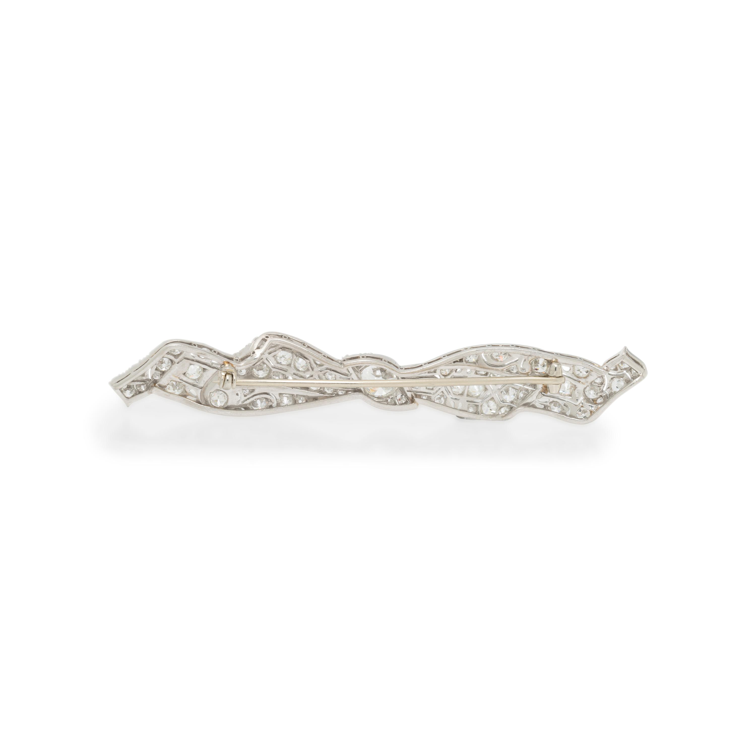 DIAMOND AND PLATINUM BOW BROOCH
