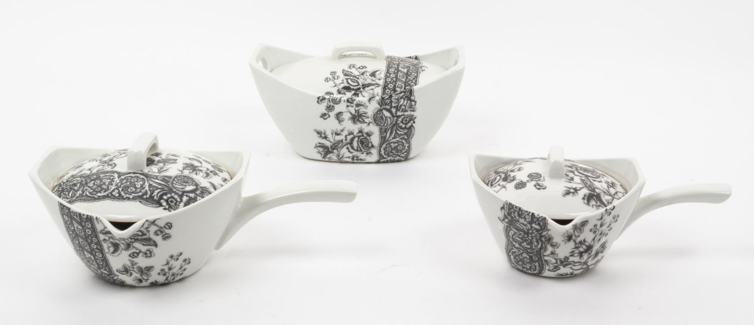 A Set of French Porcelain Serving Articles Height of coffee pot 11 1/4 inches.