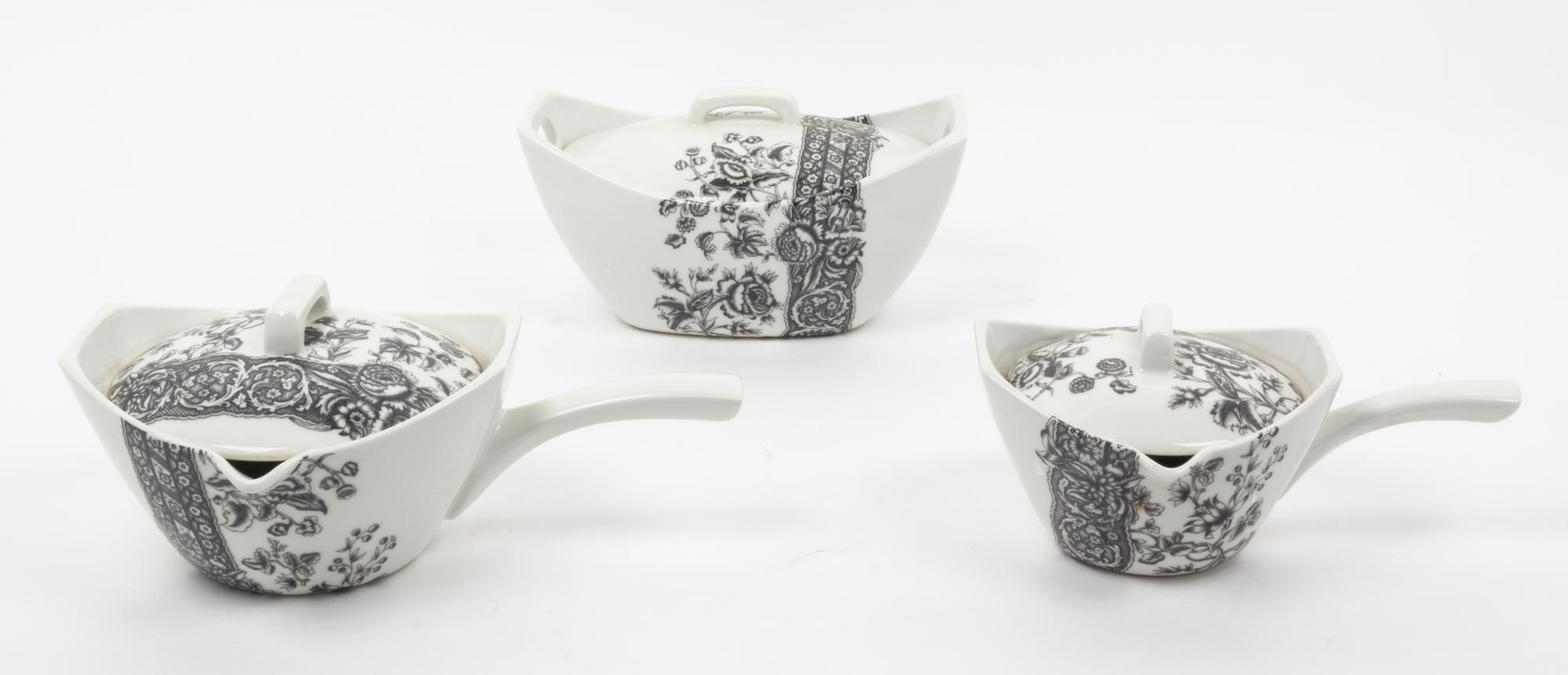 A Set of French Porcelain Serving Articles Height of coffee pot 11 1/4 inches.