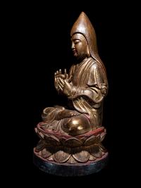 A Tibetan Gilt Lacquered Wood Figure of Tsongkapa