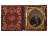 [EARLY PHOTOGRAPHY]. A group of 2 tintypes of African Americans, incl. female and male subjects.