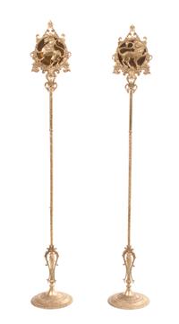 A Pair of American Gilt Metal Torchieres, Height 69 inches.