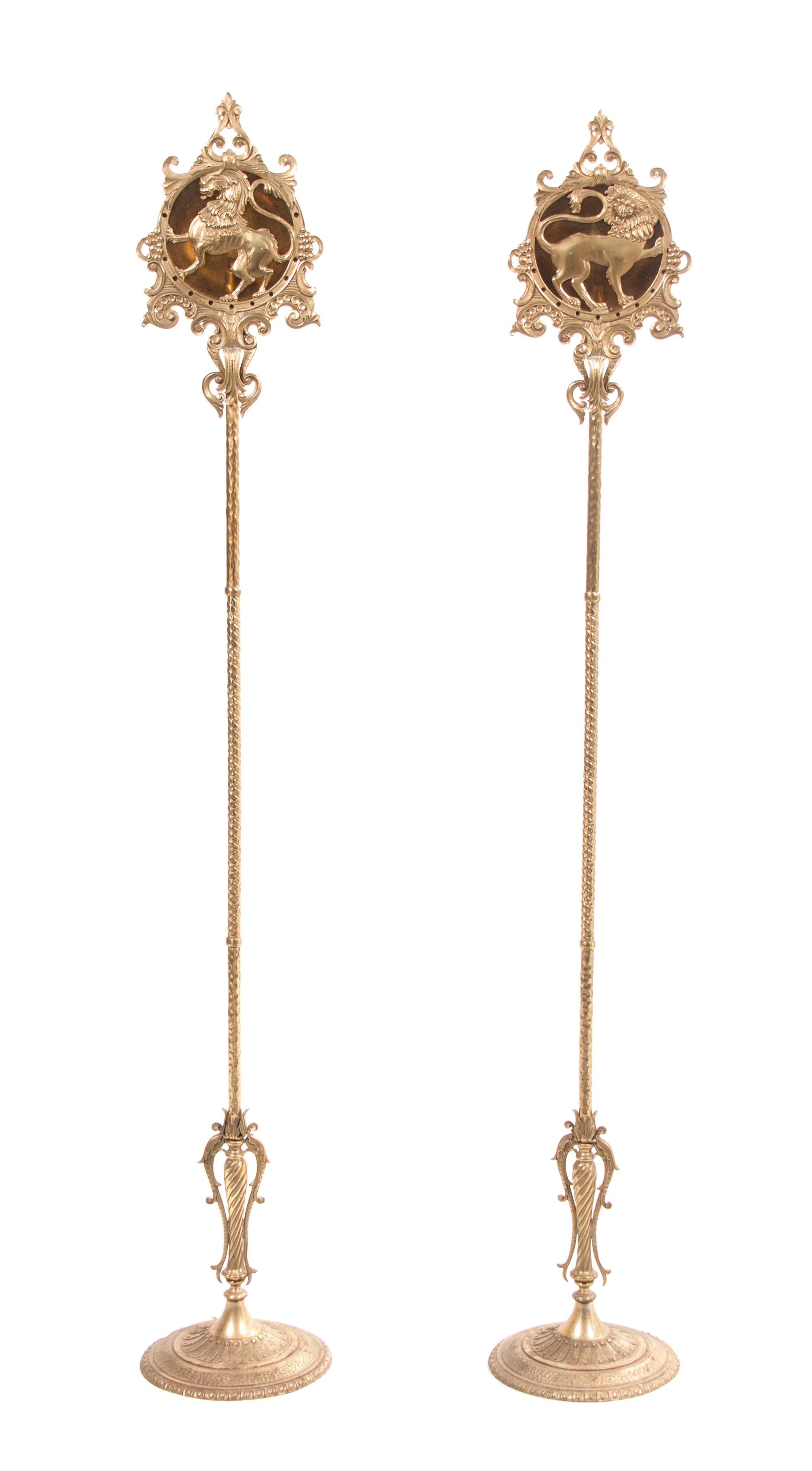 A Pair of American Gilt Metal Torchieres, Height 69 inches.