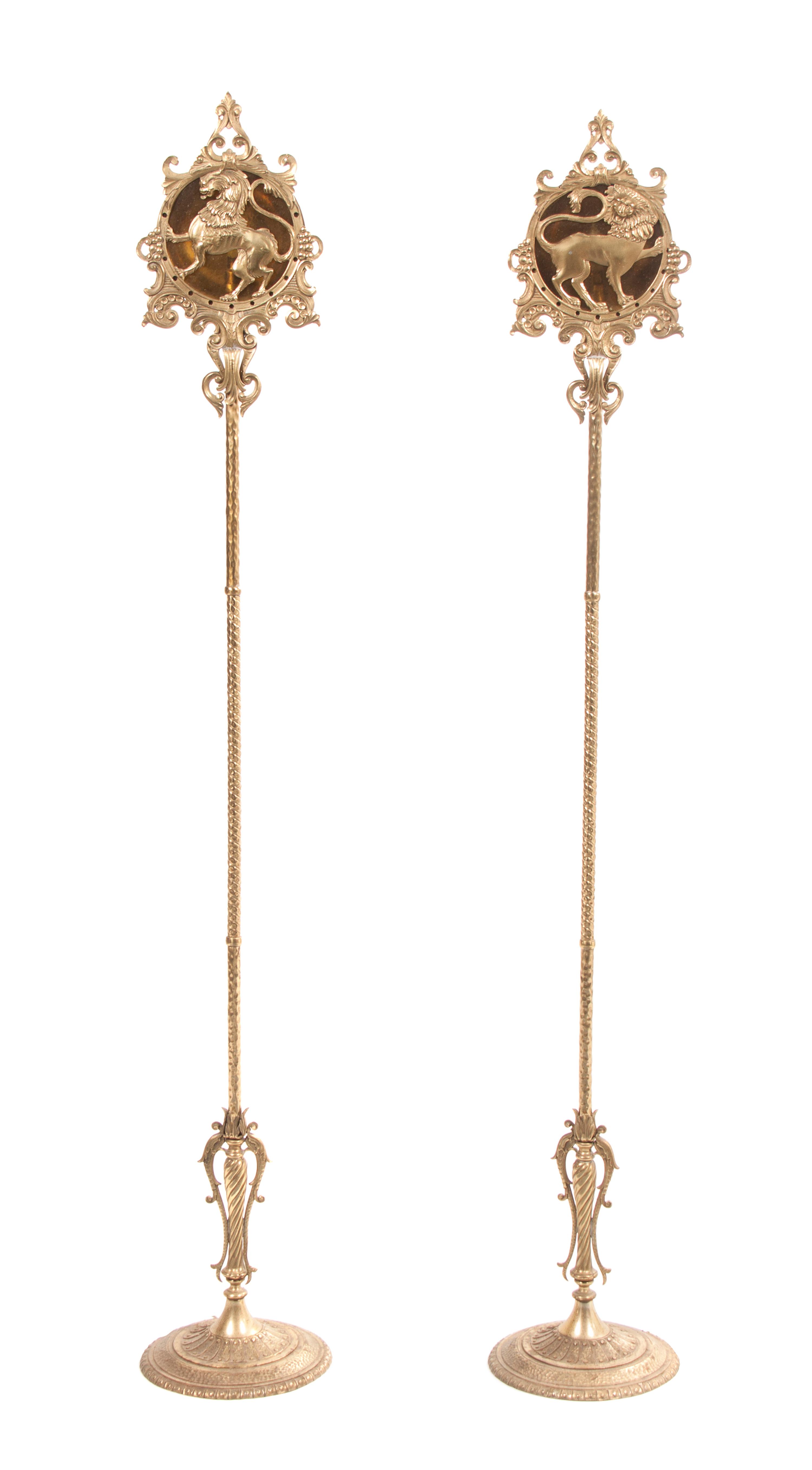 A Pair of American Gilt Metal Torchieres, Height 69 inches.