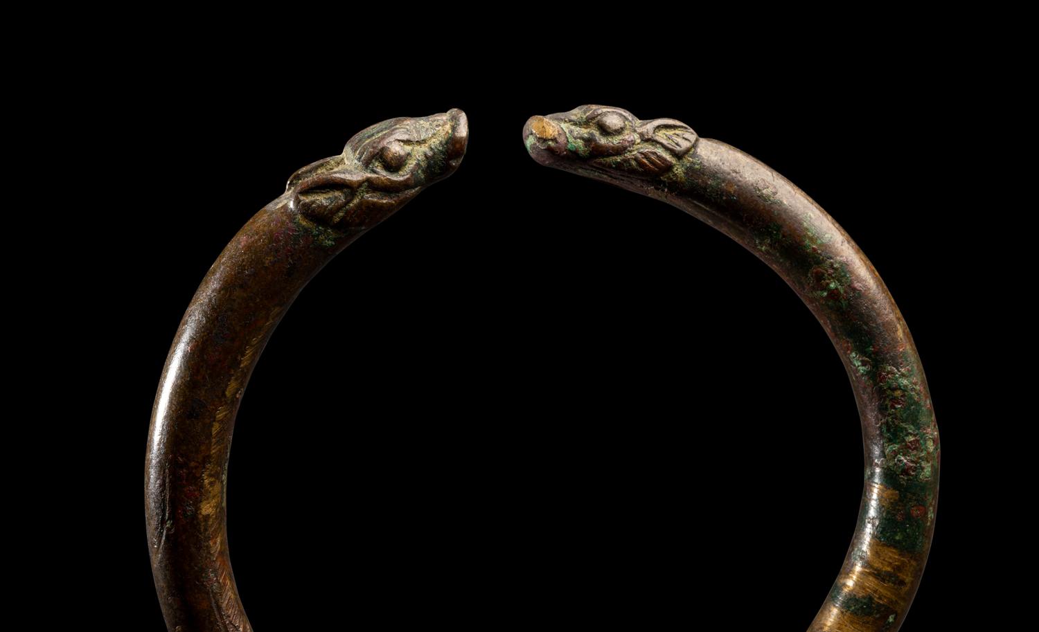 An Achaemenid or Lydian Bronze Bracelet with Calf-head Terminals