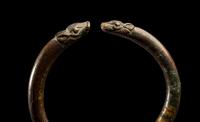 An Achaemenid or Lydian Bronze Bracelet with Calf-head Terminals