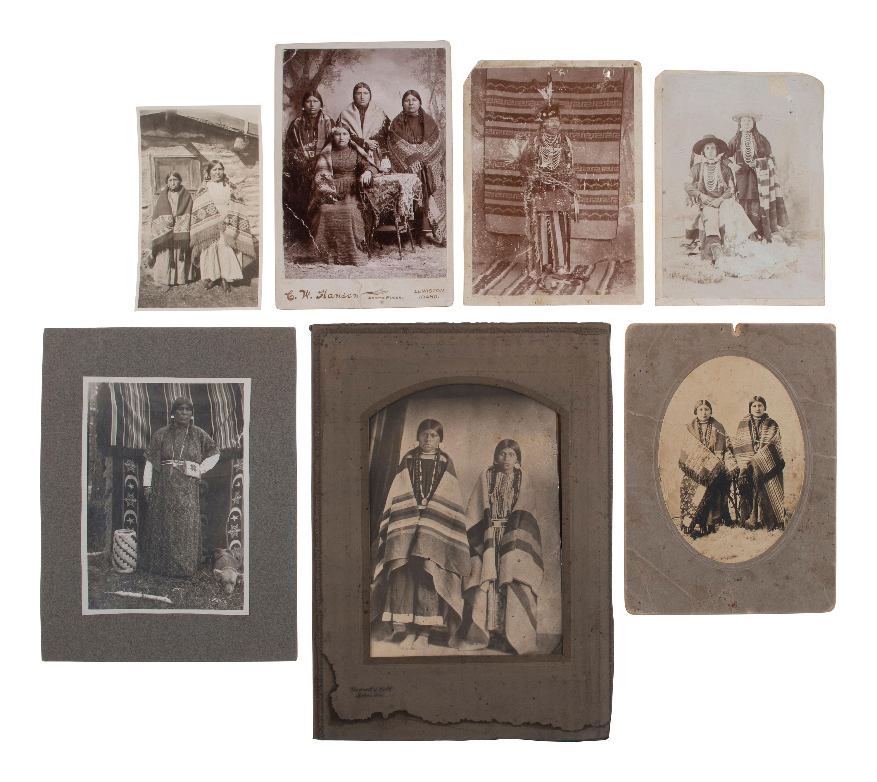 [NATIVE AMERICANS]. 18 photographs of Native American subjects, with a focus on women & children.