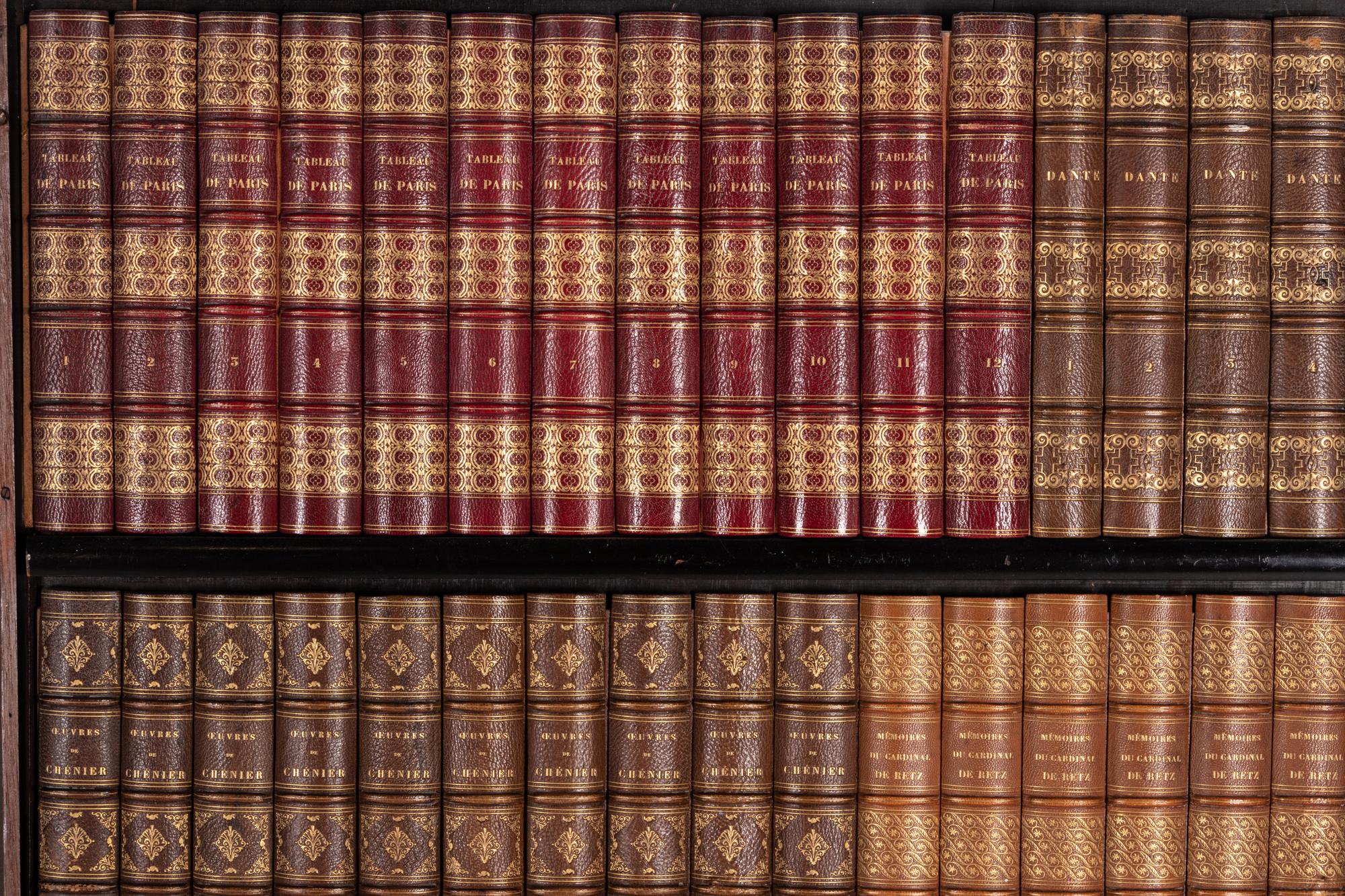 A Pair of Faux Book Wall Panels