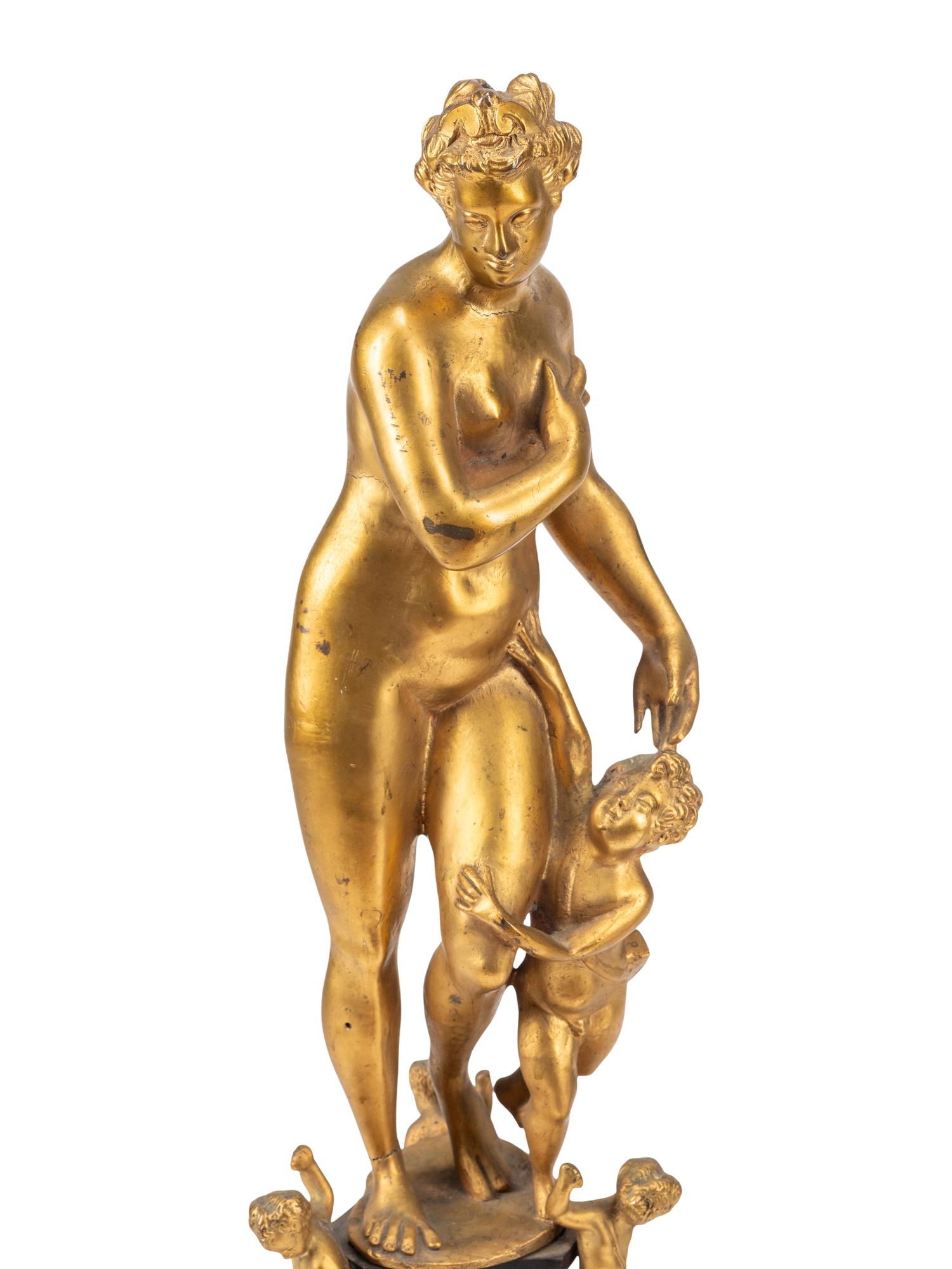 A Pair of Large Baroque Style Gilt and Patinated Bronze Figural Chenets