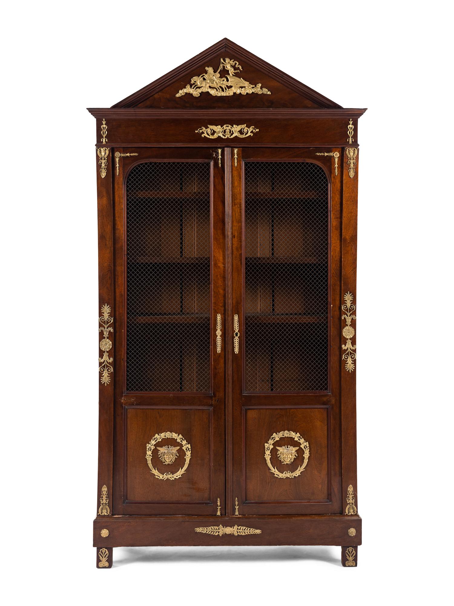 An Empire Style Gilt Metal Mounted Mahogany Bookcase