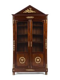 An Empire Style Gilt Metal Mounted Mahogany Bookcase