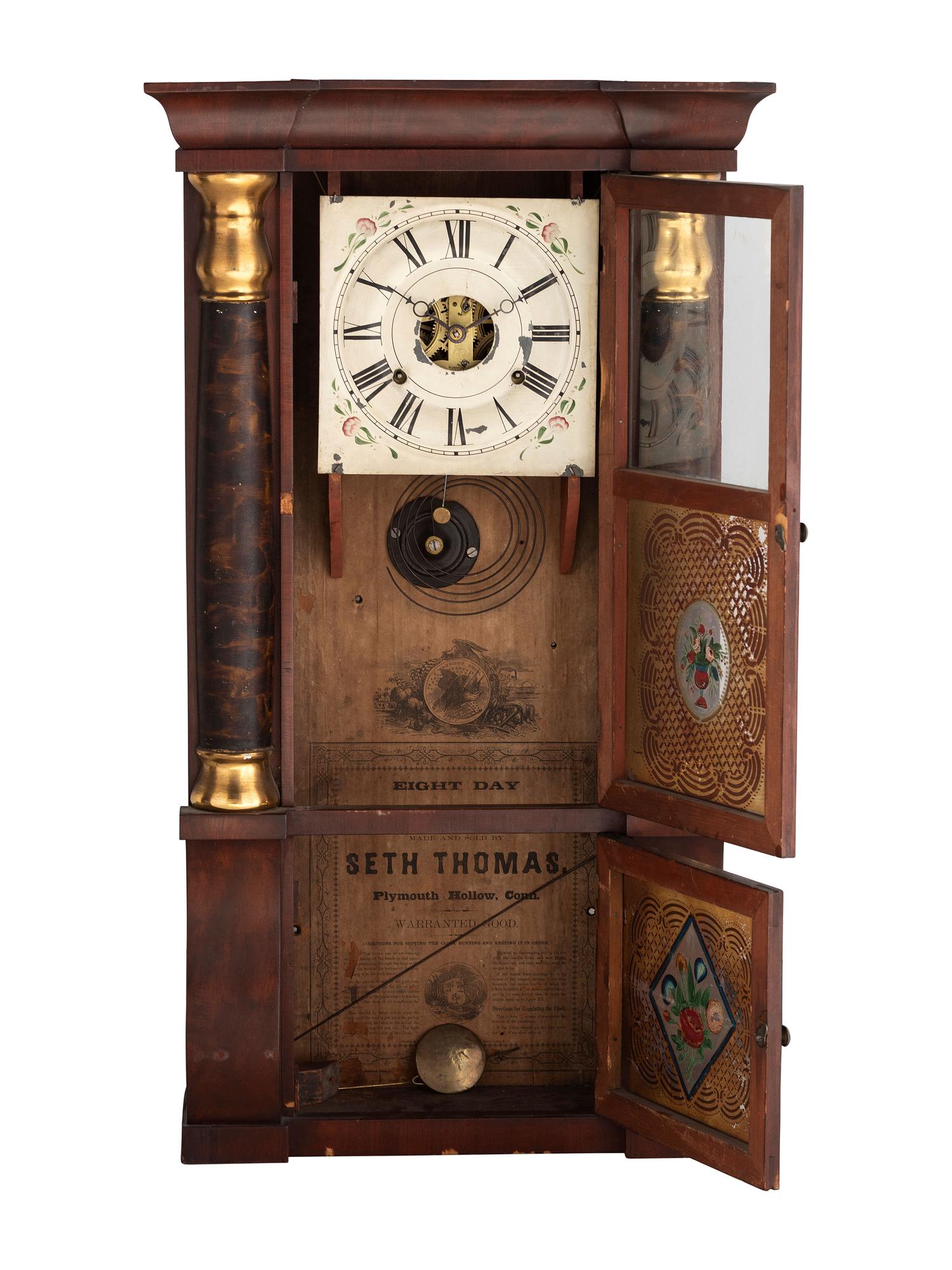 An American Classical Mahogany Eglomise Mantel Clock