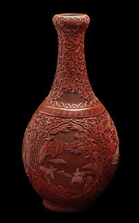 A Chinese Carved Red Lacquer Bottle Vase