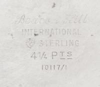 An American Silver Pitcher, International Silver Co., Meriden, CT, in the Beacon Hill pattern.