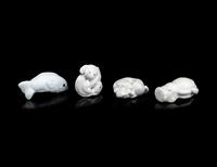Four Japanese White Glazed Porcelain Animal-Form Netsuke