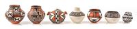 A Group of Thirteen Acoma Pueblo Pottery Articles Height of tallest 1 5/8 inches. — Various Makers