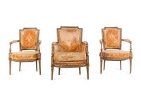 A Pair of Directoire Painted and Parcel Gilt Fauteuils and a Directoire Painted and Parcel Gilt Bergère