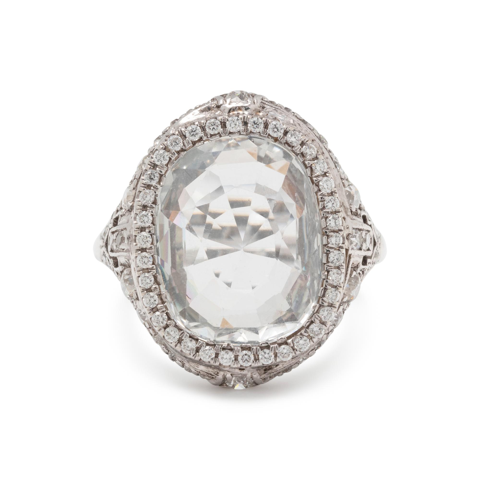 COLORLESS SAPPHIRE AND DIAMOND RING