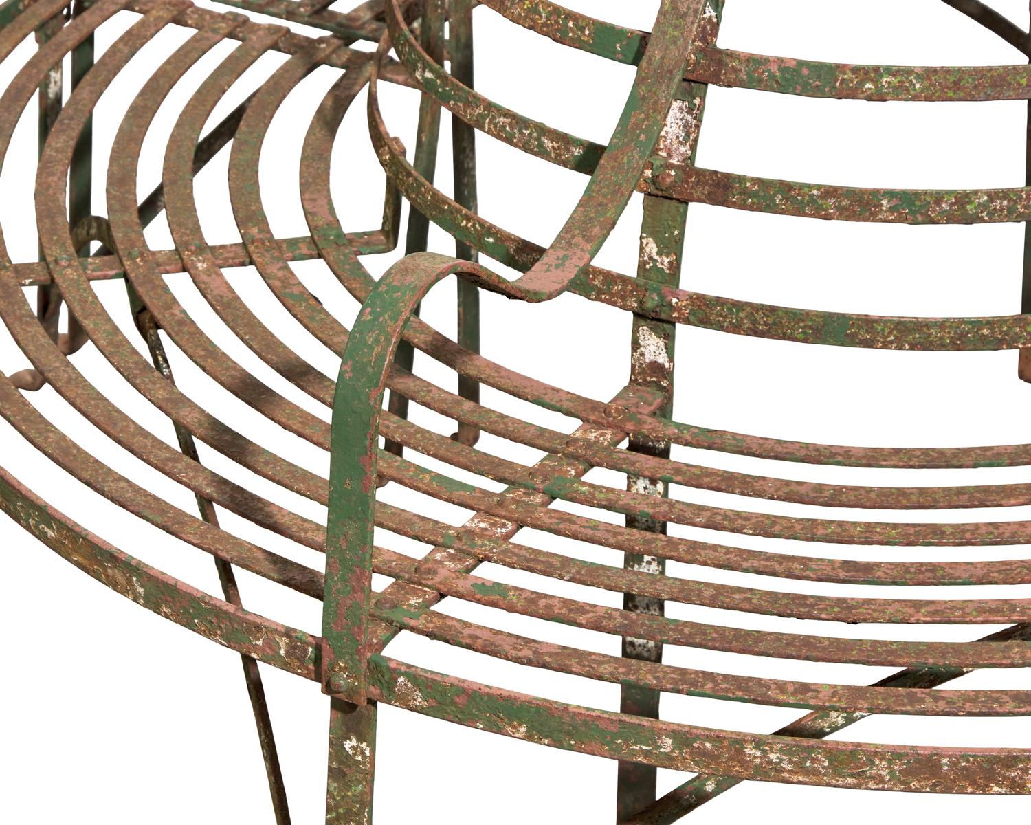 A Pair of Curved Wrought Iron Tree Benches