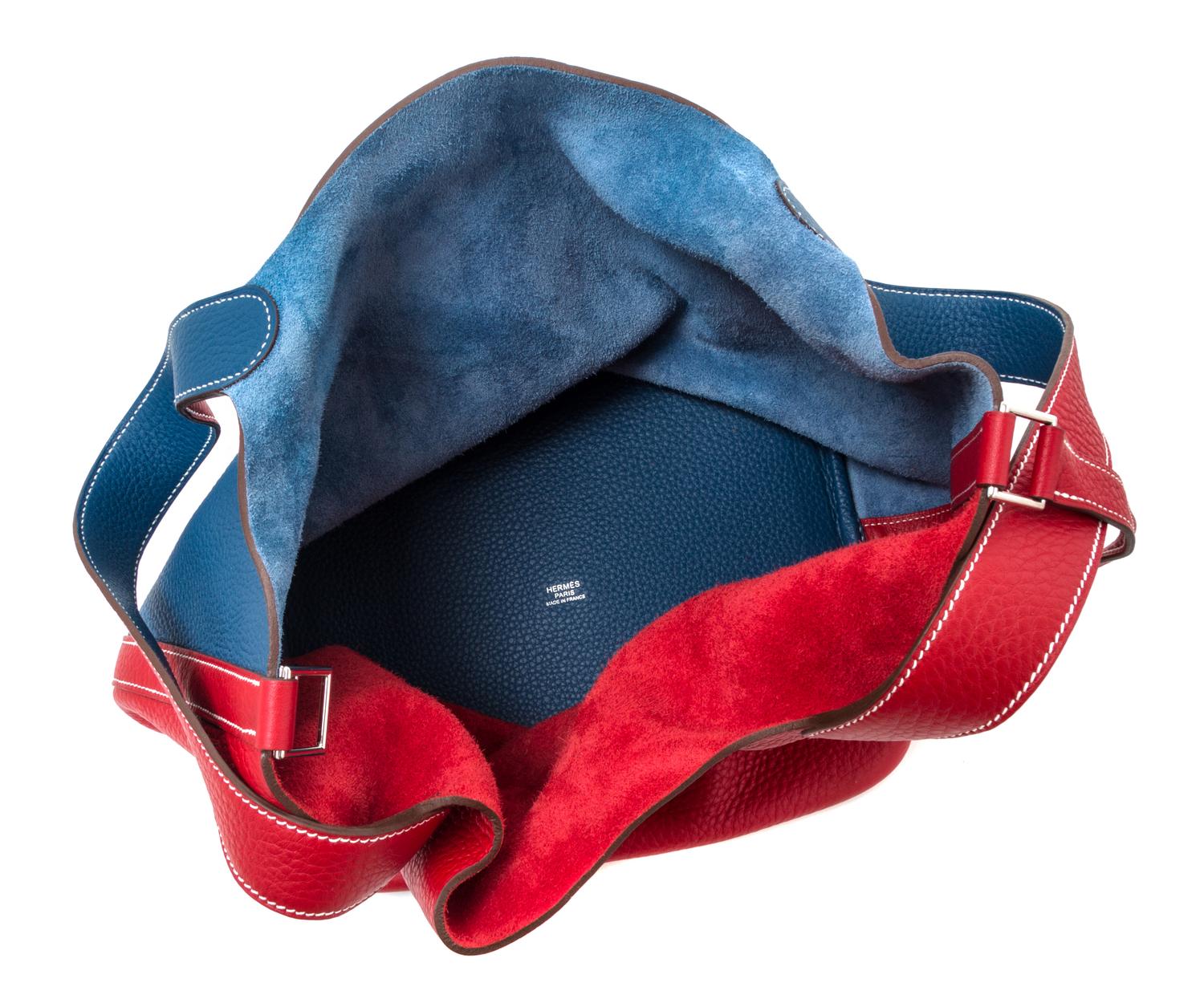 An Hermes Rouge Casaque and Bleu Taurillon Clemence Picotin Lock GM Handbag, 10.5" x 10.5" x 8.5".